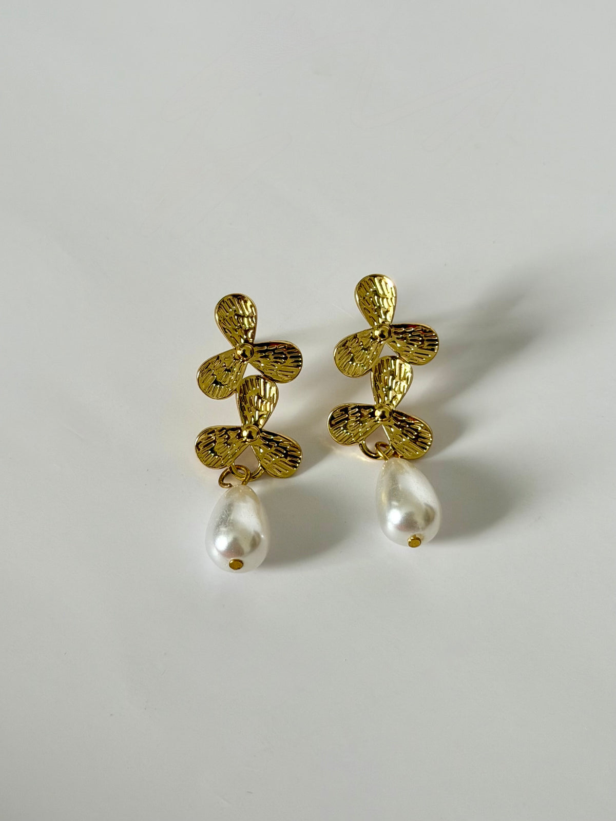 Elodie gold floral drop earrings with white teardrop pearls